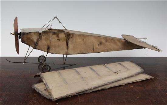 An early 20th century scratch built model of an aeroplane, 12in.